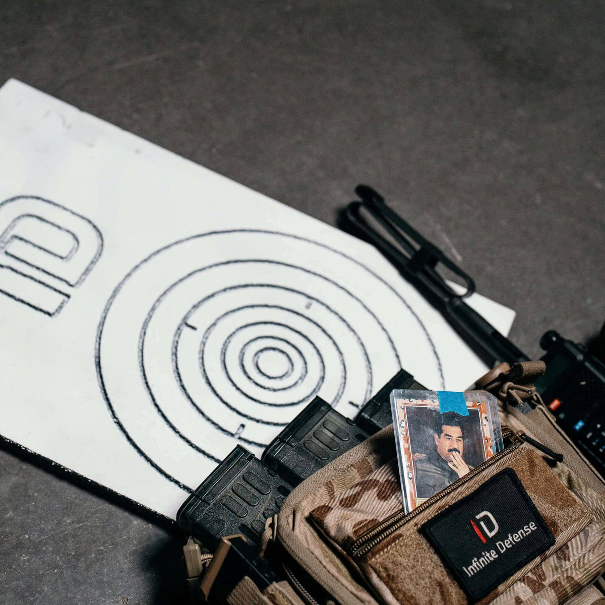 Shooter running pistol shooting drills on an Infinity Targets self healing bullseye target at the range