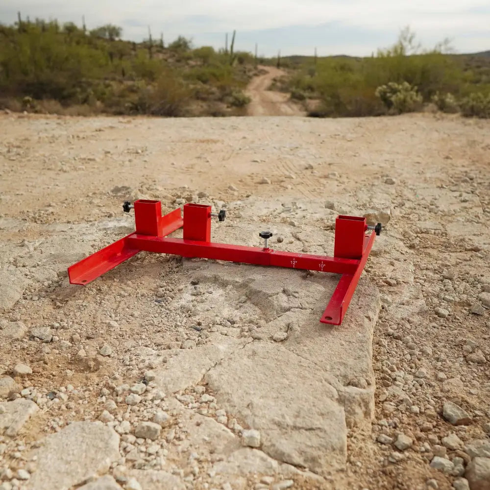 Target Stand at outdoor range on a rocky surface with desert landscape in the background