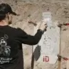 Dayron painting an infinity target